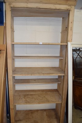 Lot 402 - Large stripped pine open front shelf unit