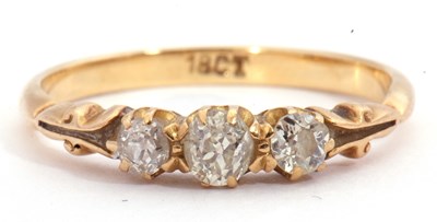 Lot 62a - Three stone diamond ring featuring three...