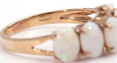 Lot 74 - Modern 9ct gold opalescent ring featuring five...