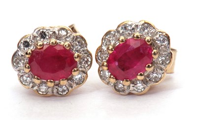 Lot 128 - A pair of modern small ruby and diamond...