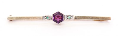 Lot 159 - Amethyst and Emerald set brooch, the hexagonal...