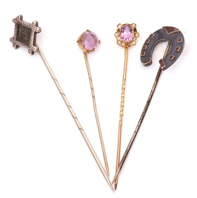 Lot 167 - Group of four stick pins to include amethyst...