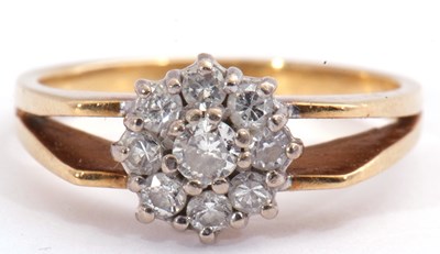 Lot 82 - Diamond cluster ring, a flowerhead design,...