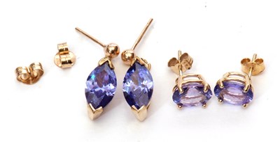 Lot 168 - A pair of 14k stamped iolite earrings, oval...