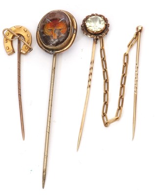 Lot 173 - Group of three stick pins to include a 9ct...