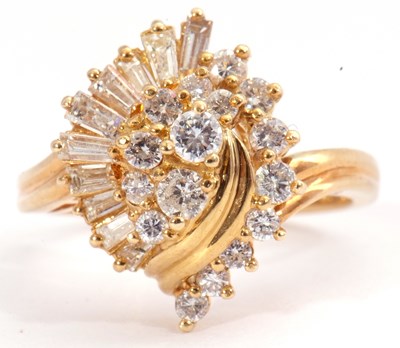 Lot 95 - 18ct gold and diamond cluster ring, a swirl...