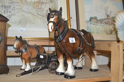 Lot 572 - Two model shire horses and a cart