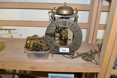 Lot 670 - Reproduction lantern style clock plus further...