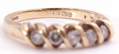 Lot 128 - Modern 9ct gold five stone diamond ring...