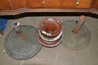 Lot 737 - Mixed Lot: Two cast iron parasol bases and a...