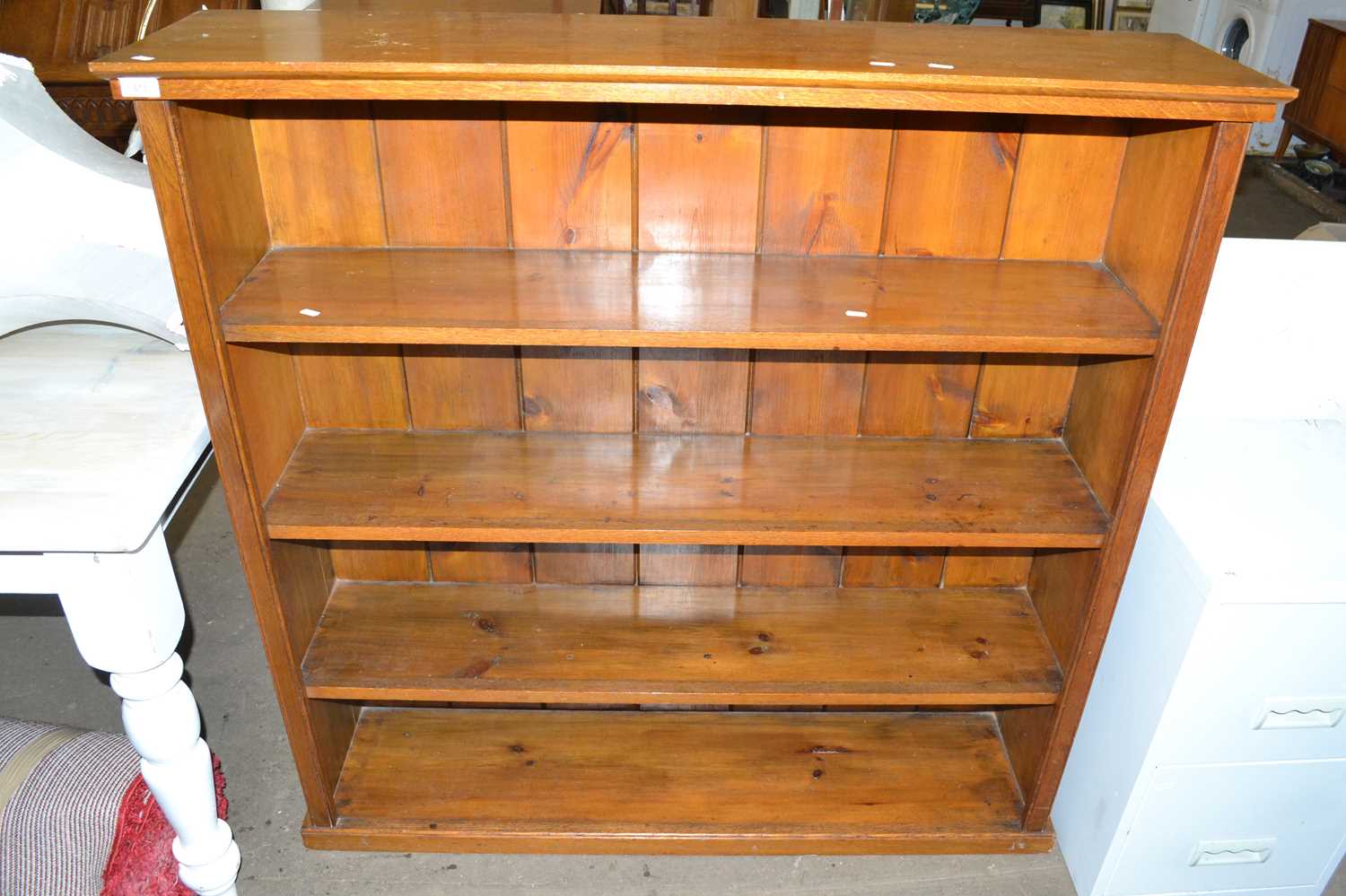 Lot 873 - Oak open front bookcase