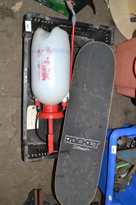 Lot 890 - Skateboard and a weed sprayer