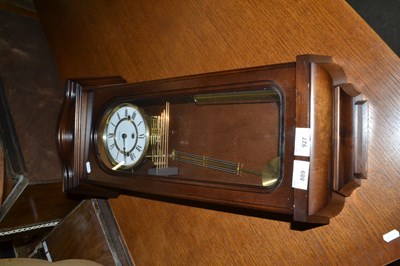 Lot 889 - Modern dark wood cased wall clock