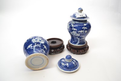 Lot 318 - Two small Chinese porcelain jars and covers...