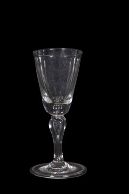 Lot 355 - 18th Century wine glass funnel bowl above a...