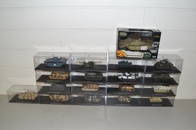 Lot 29 - A collection of cased model tanks