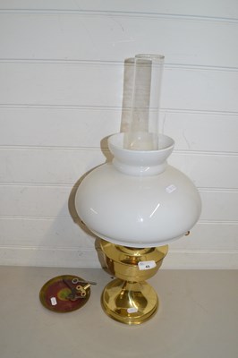 Lot 49 - Brass based oil lamp