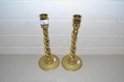 Lot 56 - Pair of brass barley twist candlesticks