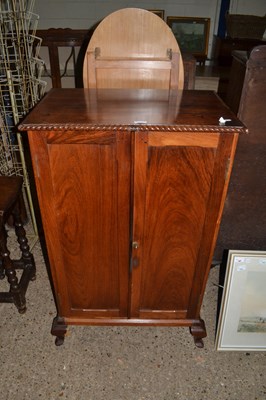 Lot 260 - Early 20th Century two door cupboard on short...