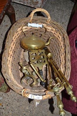 Lot 285 - Basket containing various fire tools, brass...