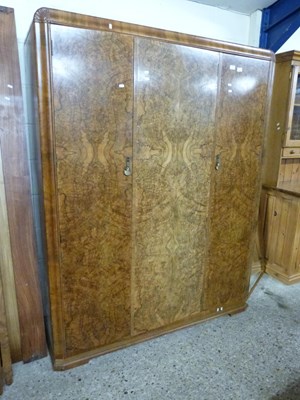 Lot 208 - Walnut veneered triple door wardrobe