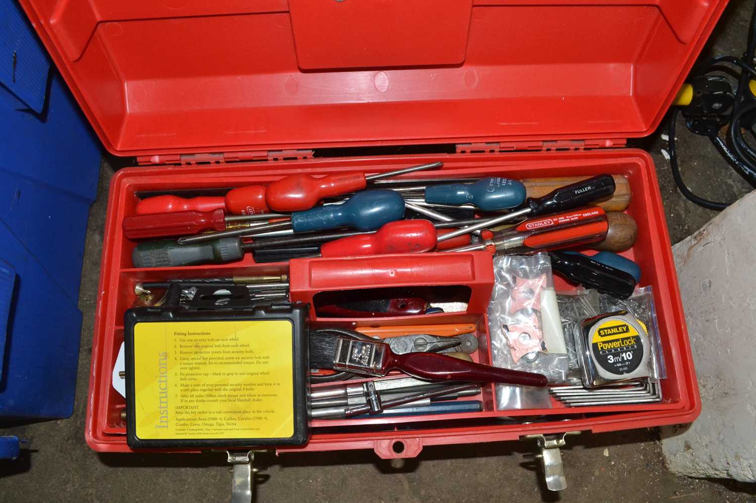 Lot 900 - Red plastic tool box and contents