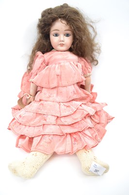 Lot 397 - Early 20th Century doll in pink costume, the...