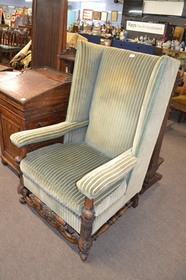 Lot 636 - Large Carolean style wing back armchair with...