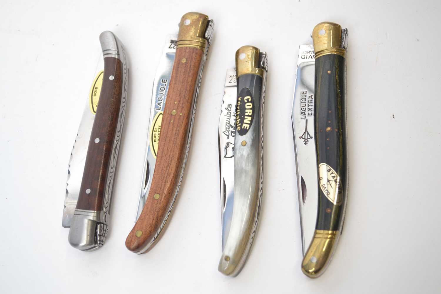 Lot 498 - Four Laguiole pen knives