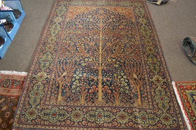 Lot 651 - Antique Persian wool rug with tree of life and...