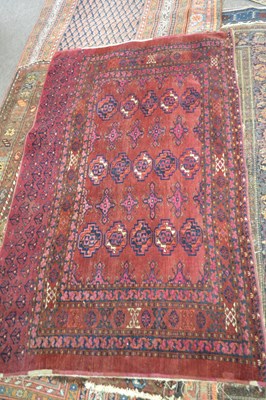Lot 658 - Small bokhara type wool floor rug with...
