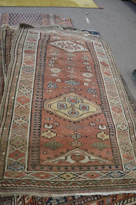 Lot 661 - Caucasian wool floor rug with two large...