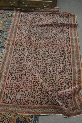 Lot 663 - Small Middle Eastern wool rug decorated with a...
