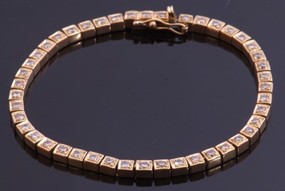 Lot 192 - Diamond line bracelet featuring 45 small...