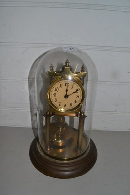 Lot 41 - Brass anniversary clock under glass dome