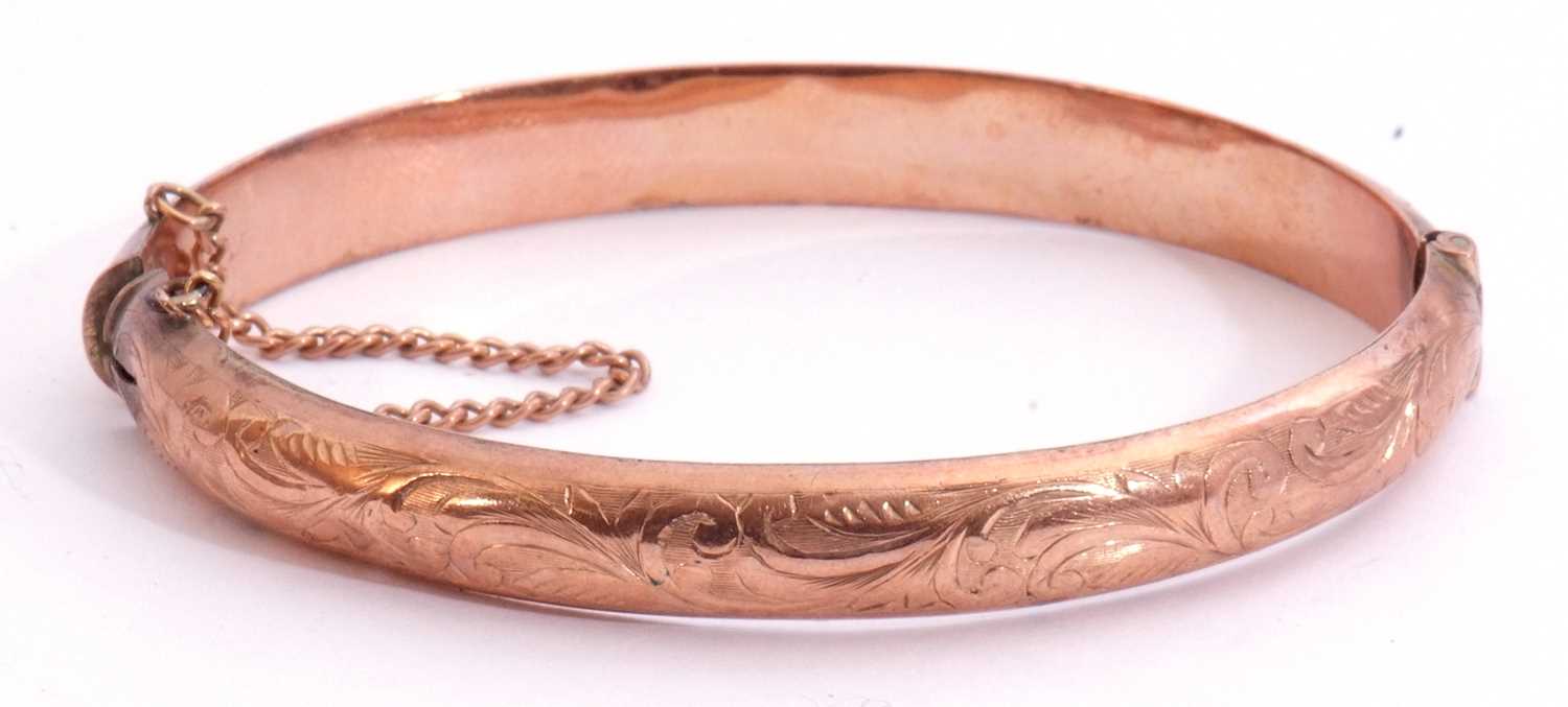 Lot 200 - 9ct gold hinged bracelet of oval form,...