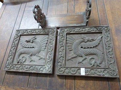 Lot 222 - A pair of panels carved with dragons together...