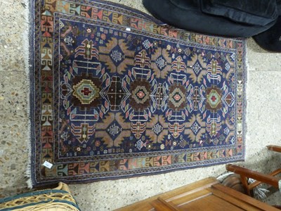 Lot 245 - Small  Middle Eastern wool floor rug decorated...