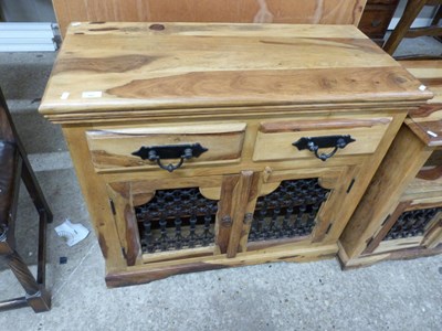 Lot 307 - Modern Sheesham wood sideboard with two doors...