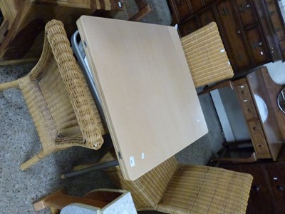 Lot 310 - Modern kitchen table and three wicker chairs