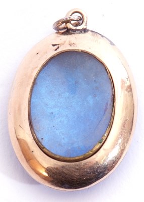 Lot 218 - Blue, red and green enamel locket of oval form,...