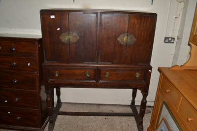 Lot 337 - An early 20th Century oak side cabinet with...