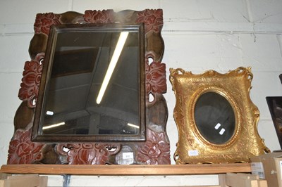 Lot 535 - Rectangular wall mirror in a carved floral...