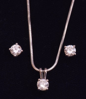Lot 247 - Pair of diamond stud earrings of round...