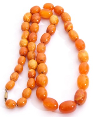 Lot 281 - Butterscotch coloured amber bead necklace, a...