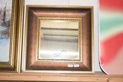 Lot 49 - Reproduction gilt framed wall mirror