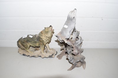 Lot 181 - Two resin  models of wolves