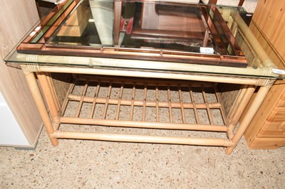 Lot 235 - Bamboo framed glass top coffee table