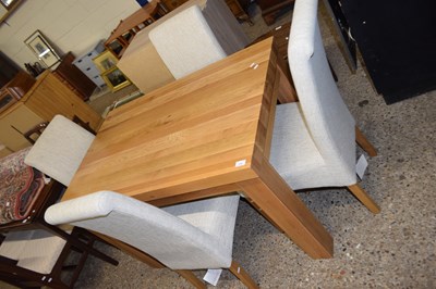 Lot 239 - Modern oak dining table and four chairs