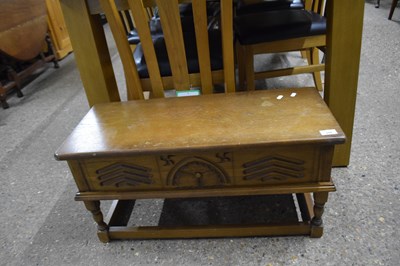 Lot 259 - Carved oak box stool, 75cm wide